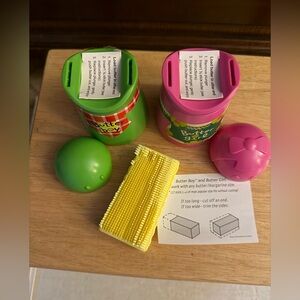 These are Talisman Designs "Butter Boy" and "Butter Girl" corn butterers.  NWT